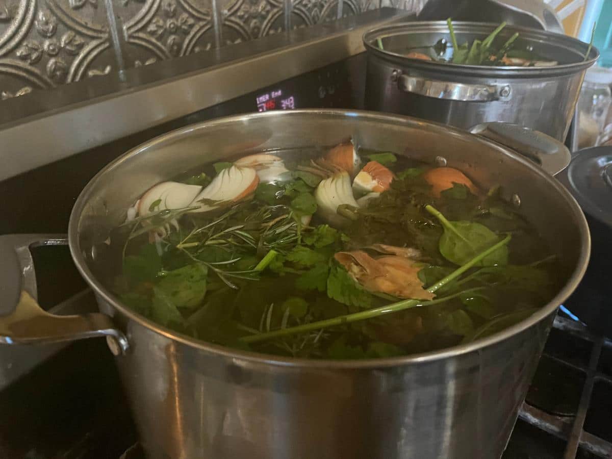 Vegetable broth cooking on a stove