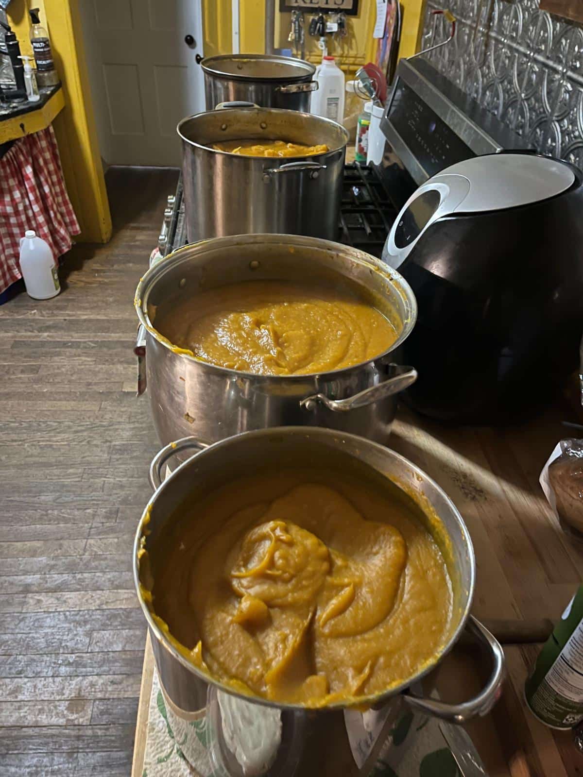 Pans of roasted butternut squash soup