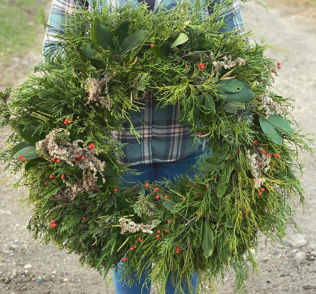 Christmas wreath with natural berries for the birds