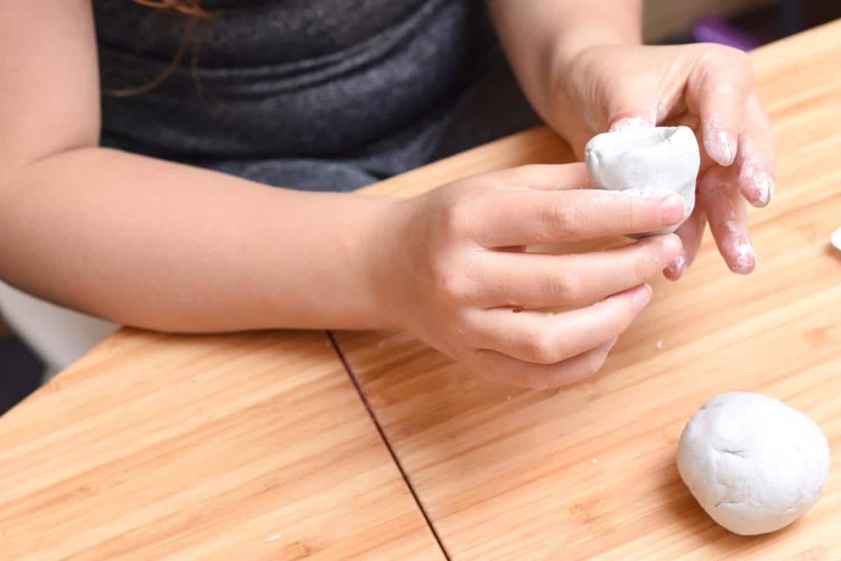 A child making a clay project