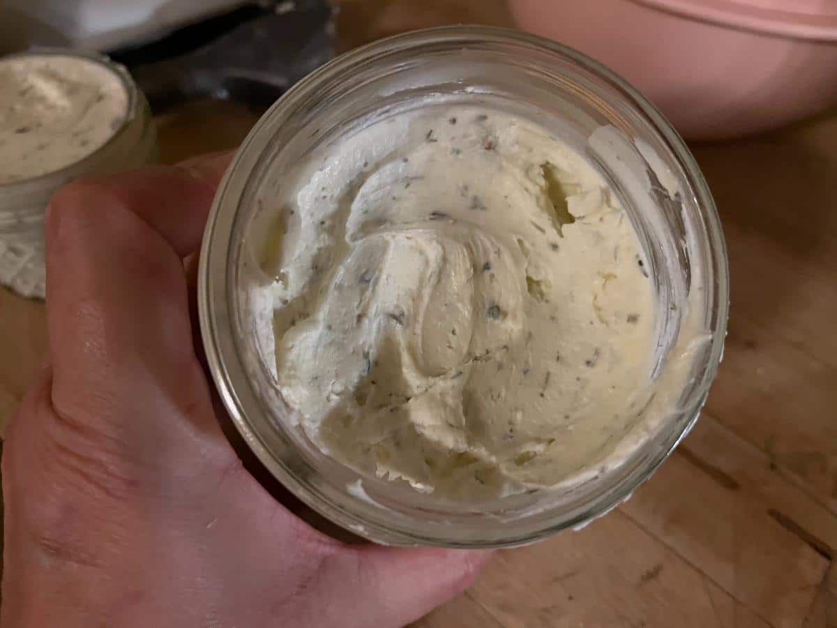 A jar of garlic cheese spread