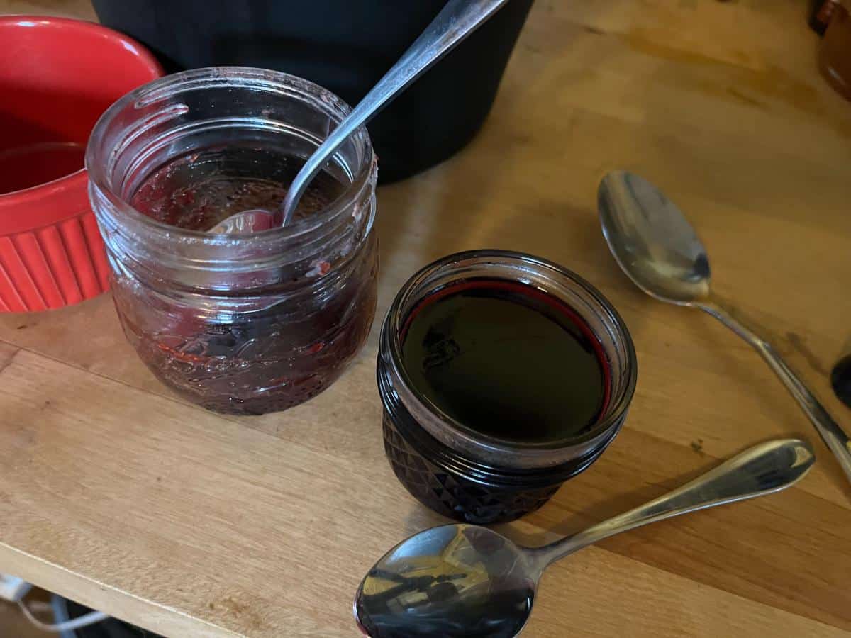 Homemade elderberry jelly and strawberry jam -- yogurt flavorings