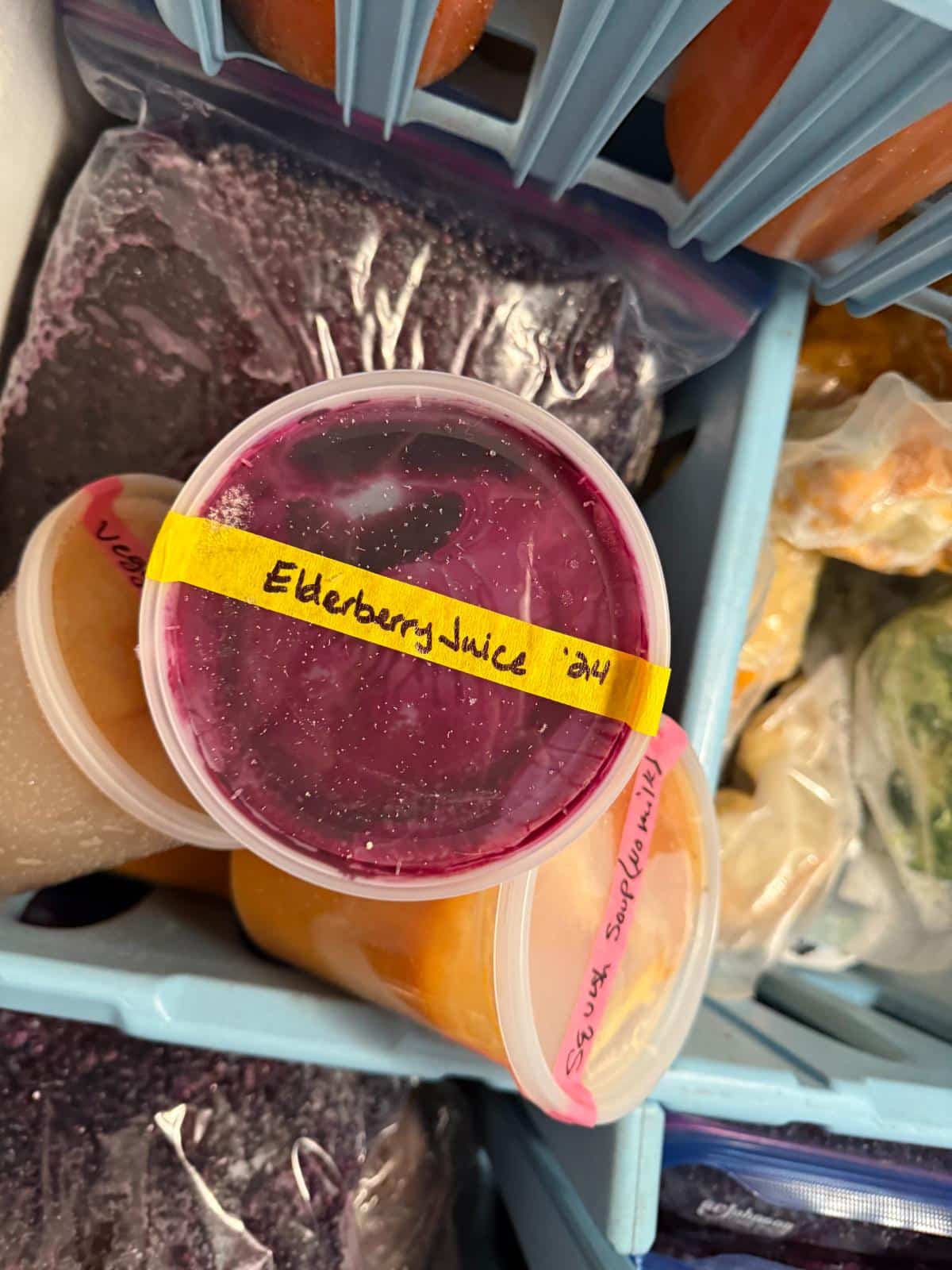 Elderberries and elderberry juice in the freezer