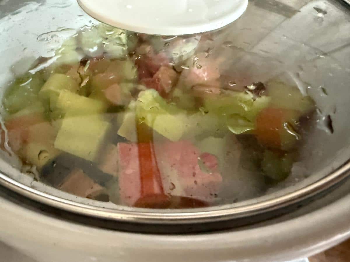Rhubarb sauce ingredients in a crock pot.