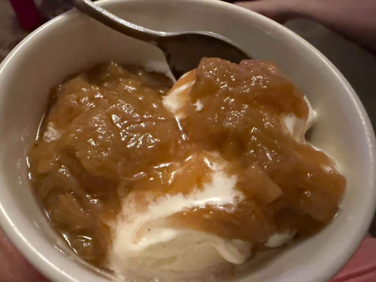 Rhubarb sauce over vanilla ice cream