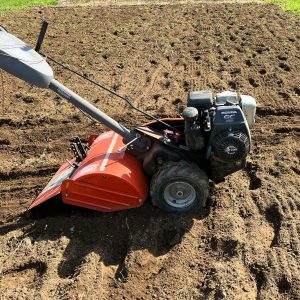 A freshly tilled ground with a rototiller.