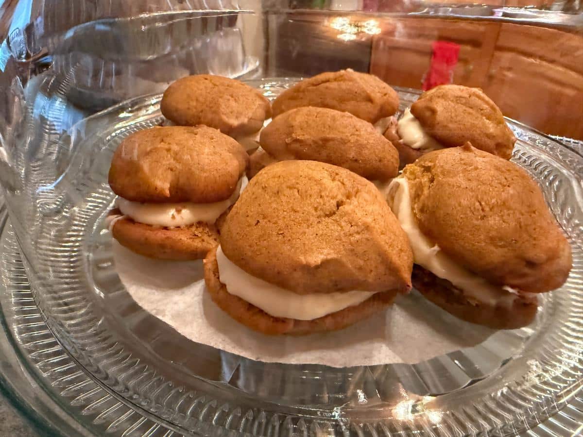 Pumpkin Whoopie Pies on a cake plate