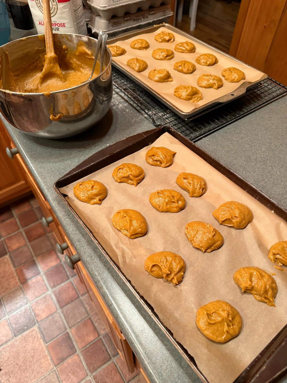 Whoopie Pie cookie batter on a pan with parchment paper